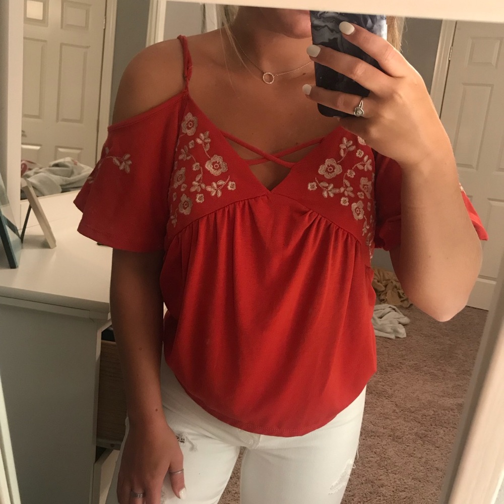 Orange off the should top